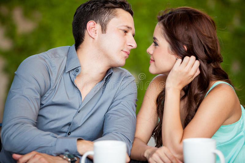 leaning kiss date young couple looking each other kissing restaurant 33777585